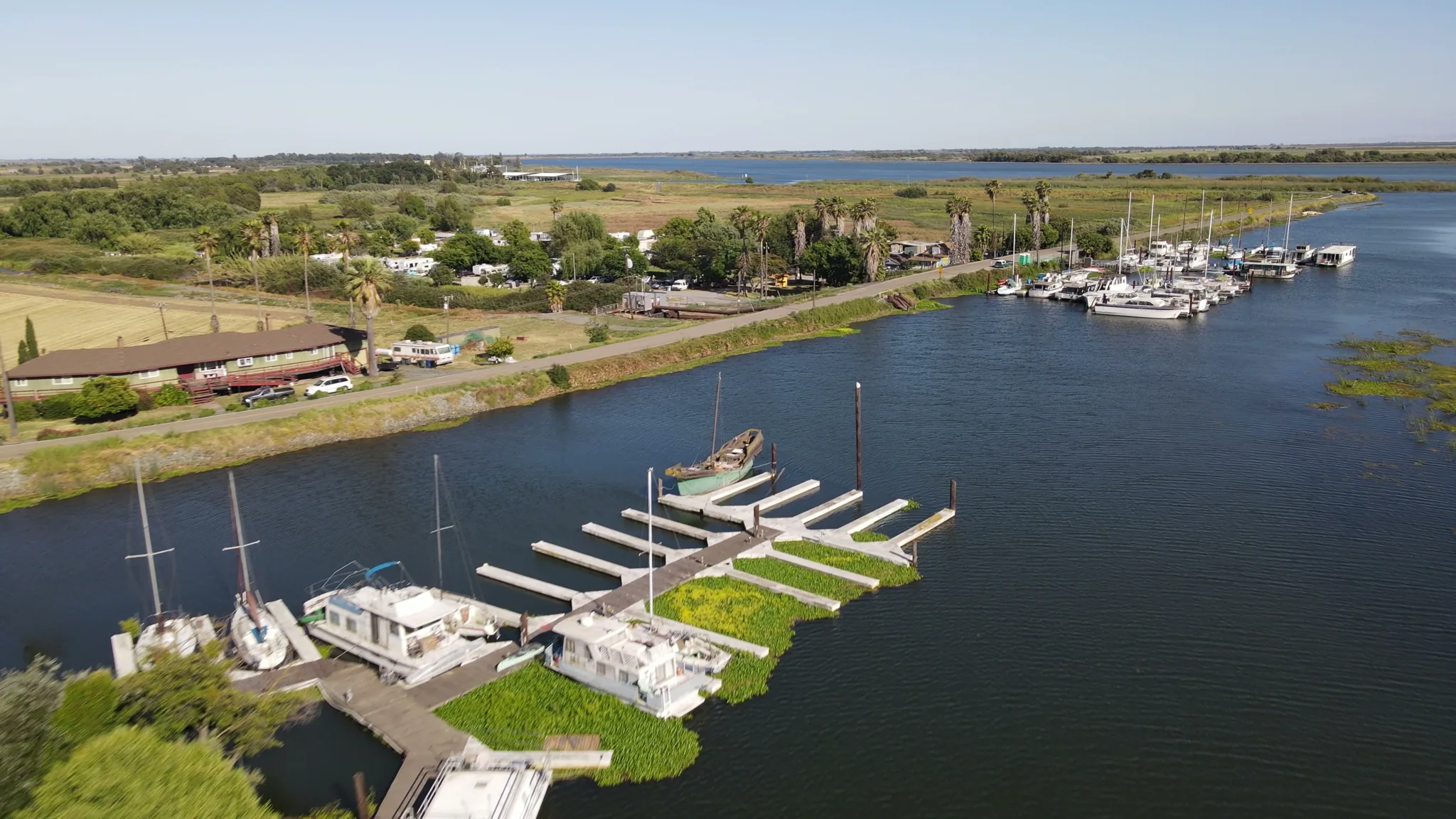Aerial view of Brother's Island Marina — docks, waterfront, marina