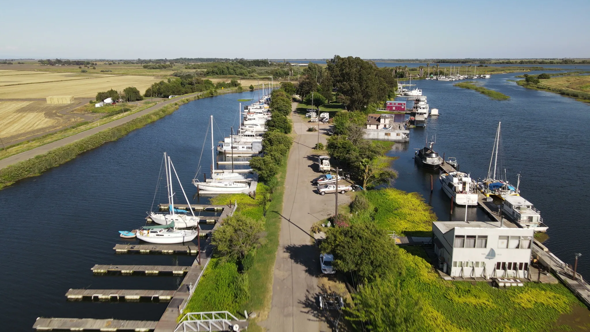 Aerial view of Brother's Island Marina — boats, waterfront, marina